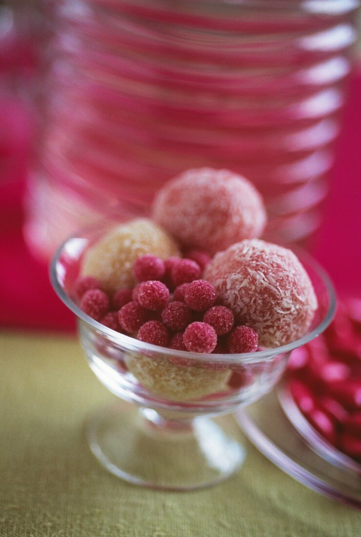 Almond paste balls coated with coconut