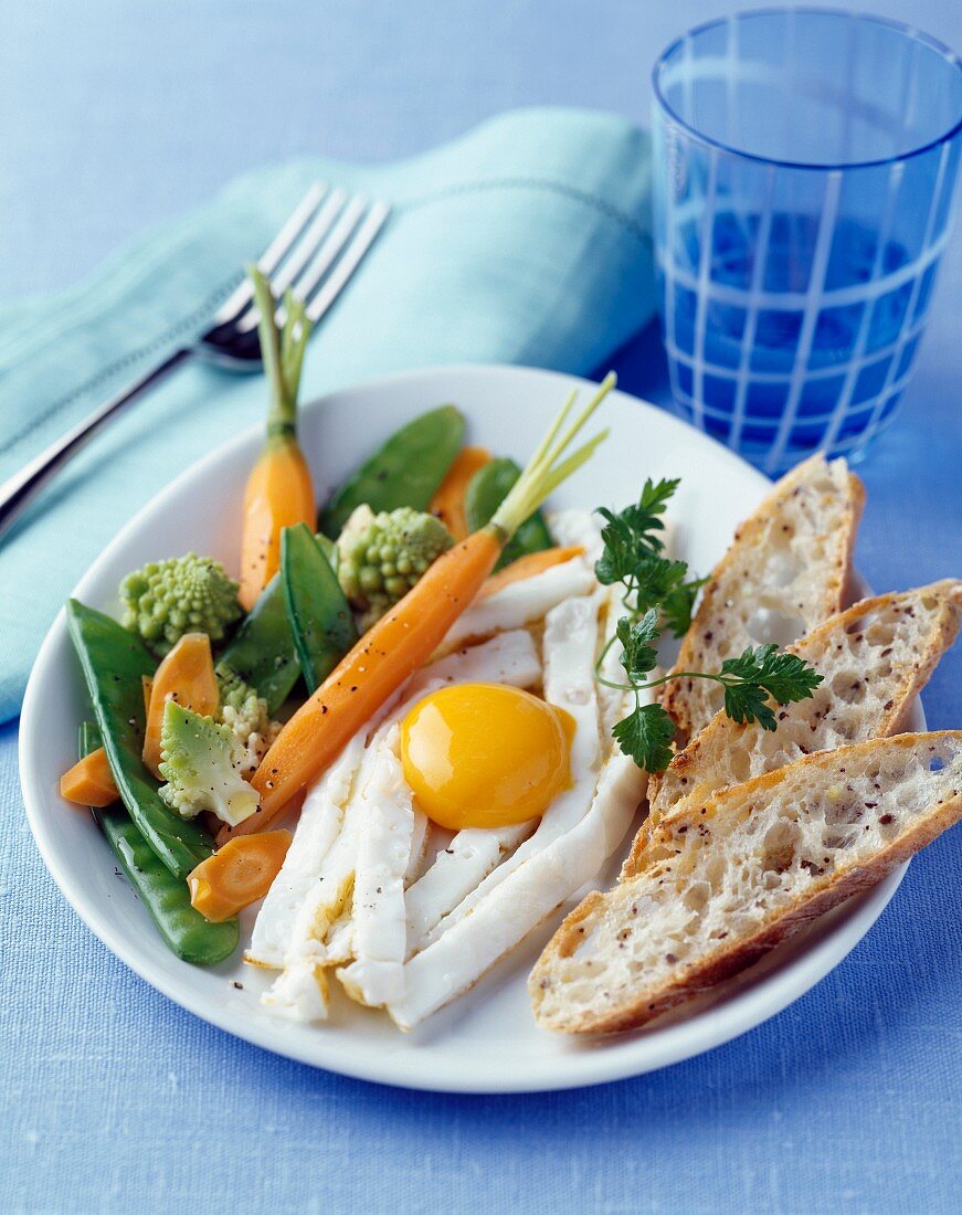 Crisp vegetable and fried egg salad