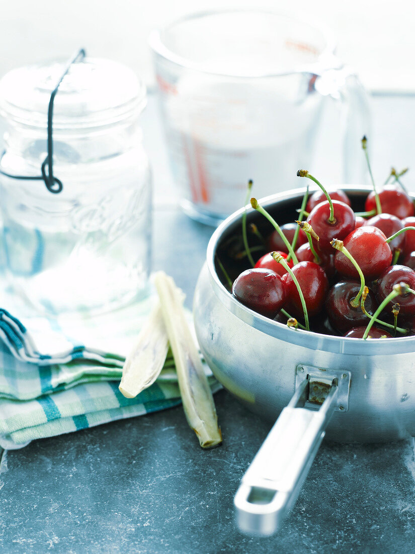 Saucepan of uncooked cherries