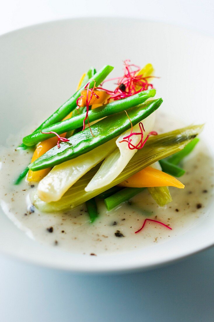 Steam-cooked vegetables with truffle emulsion