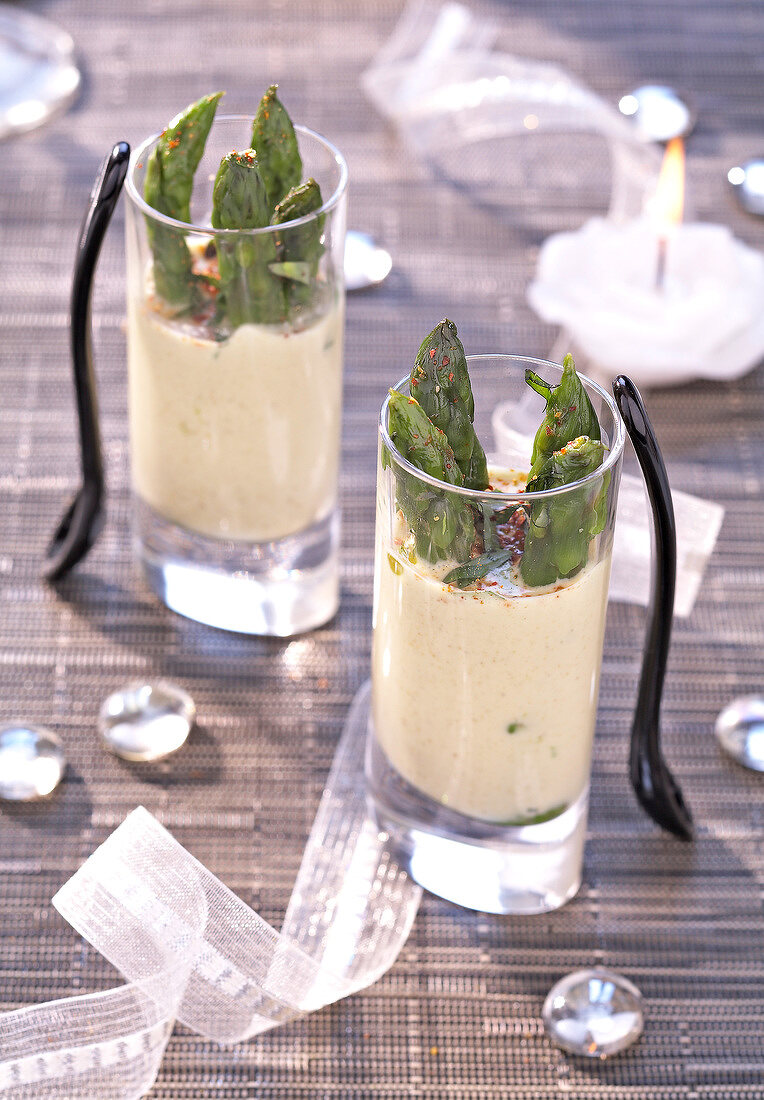 Bushy green asparagus in coconut milk