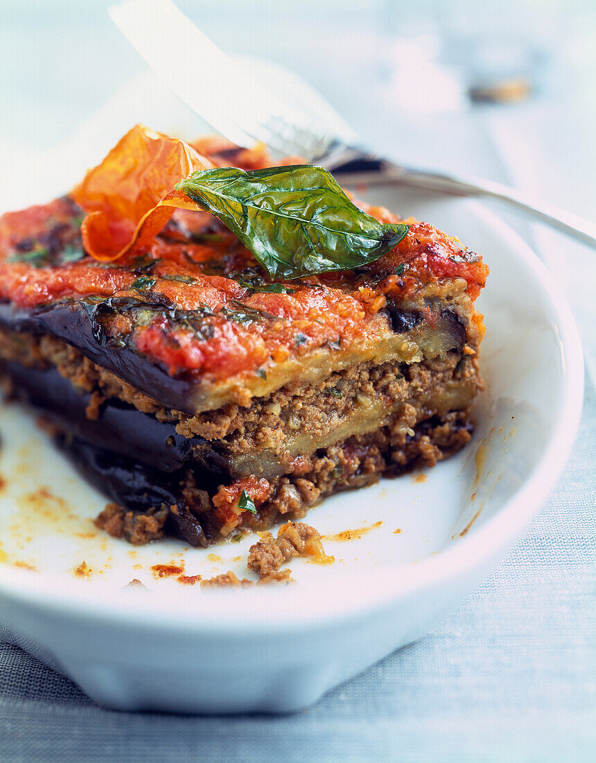Eggplant lasagnes with minced beef and basil