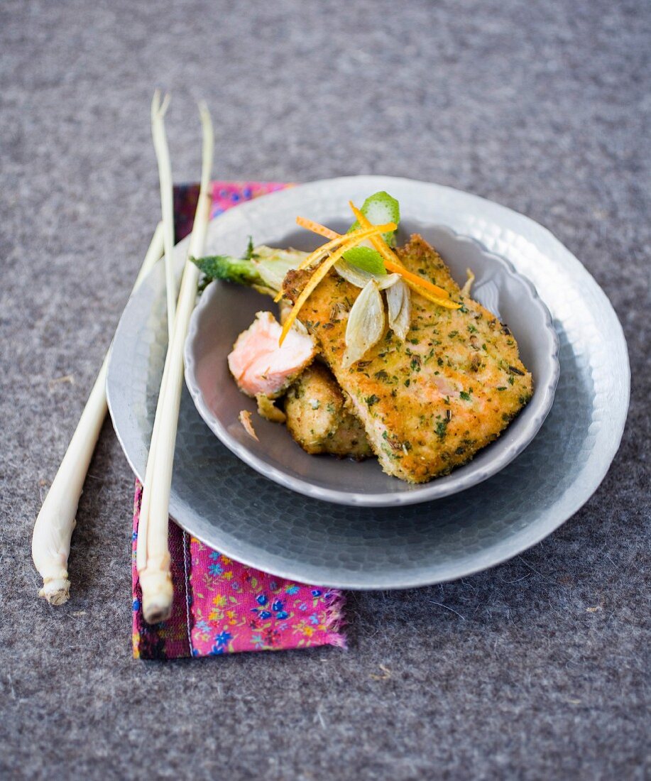 Salmon coated with breadcrumbs, herbs and orange zests