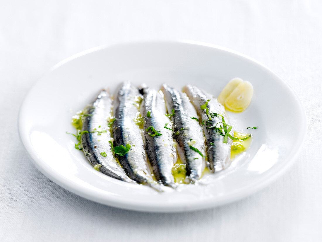 Boquerones with garlic,herbs and olive oil