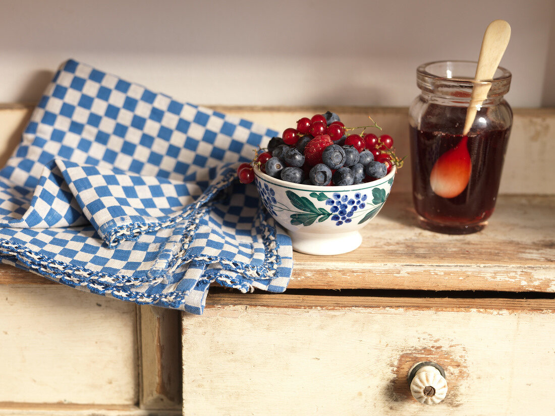 Bowl of summer fruit and summer fruit jelly