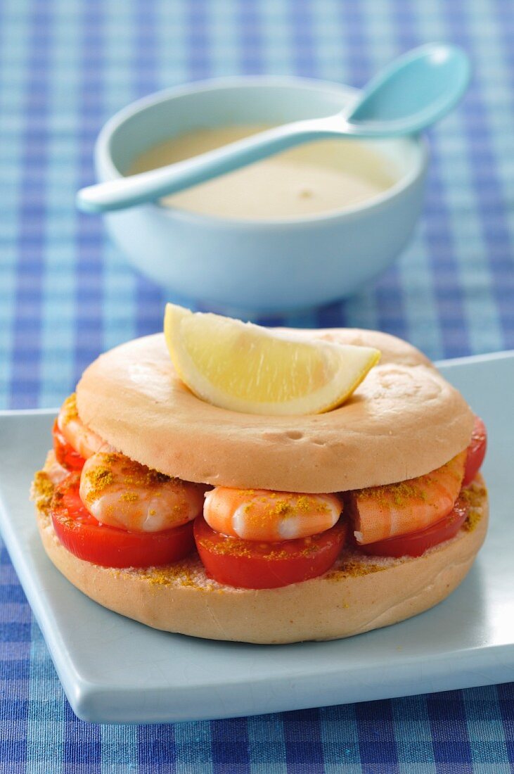 Shrimp,curry and tomato bagel sandwich