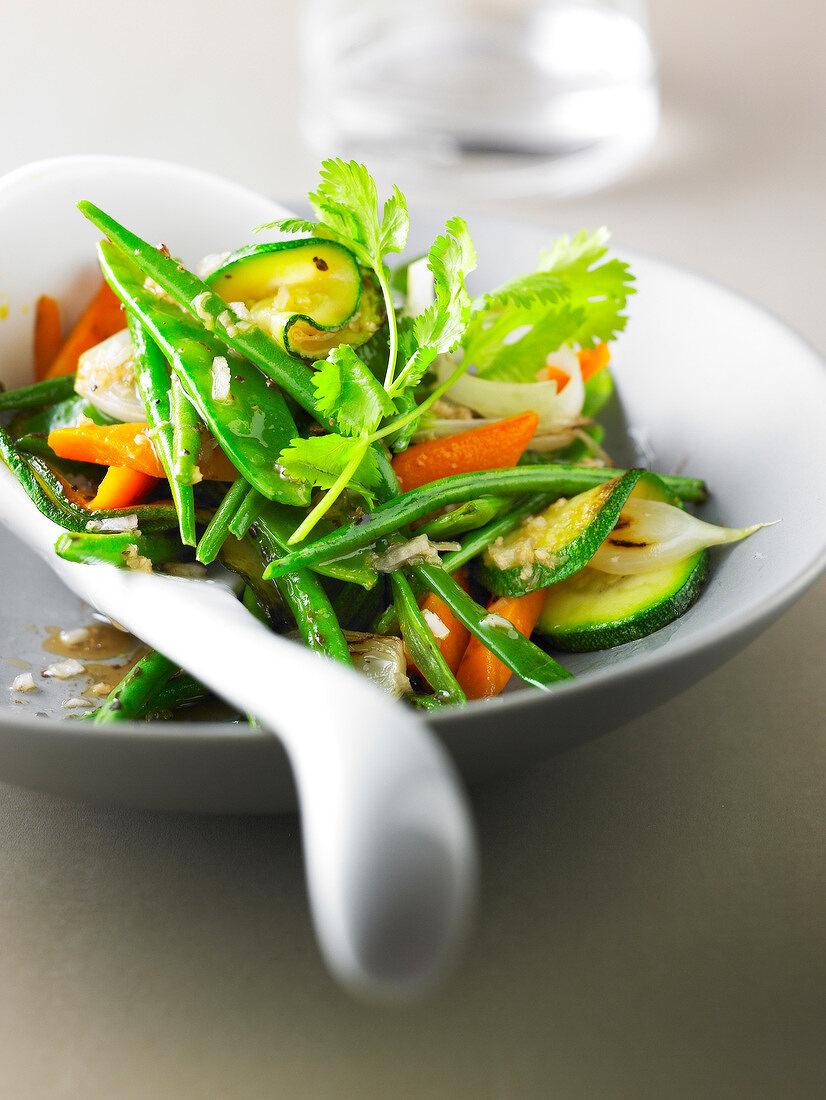 Warm vegetable salad cooked in a wok