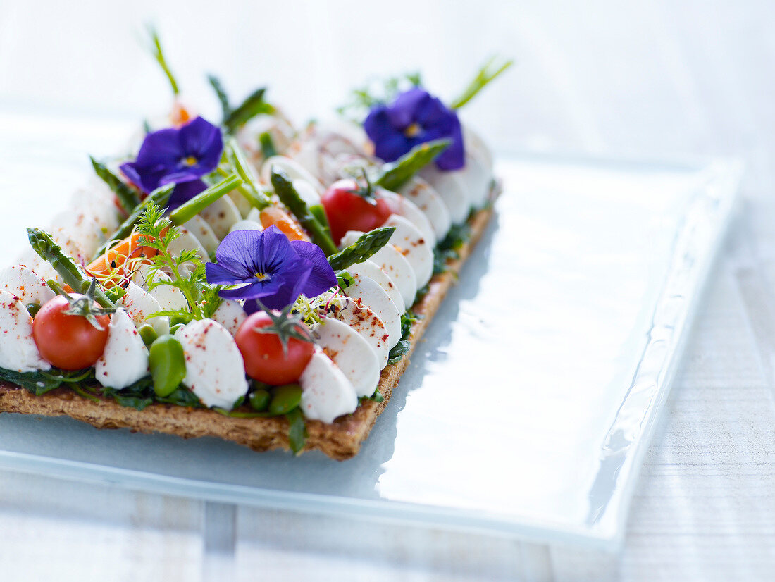 Fromage frais,spring vegetable and nasturtium tart