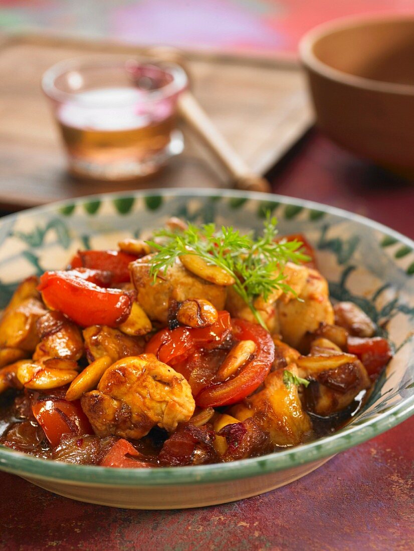 Chicken with honey, tomato and almonds