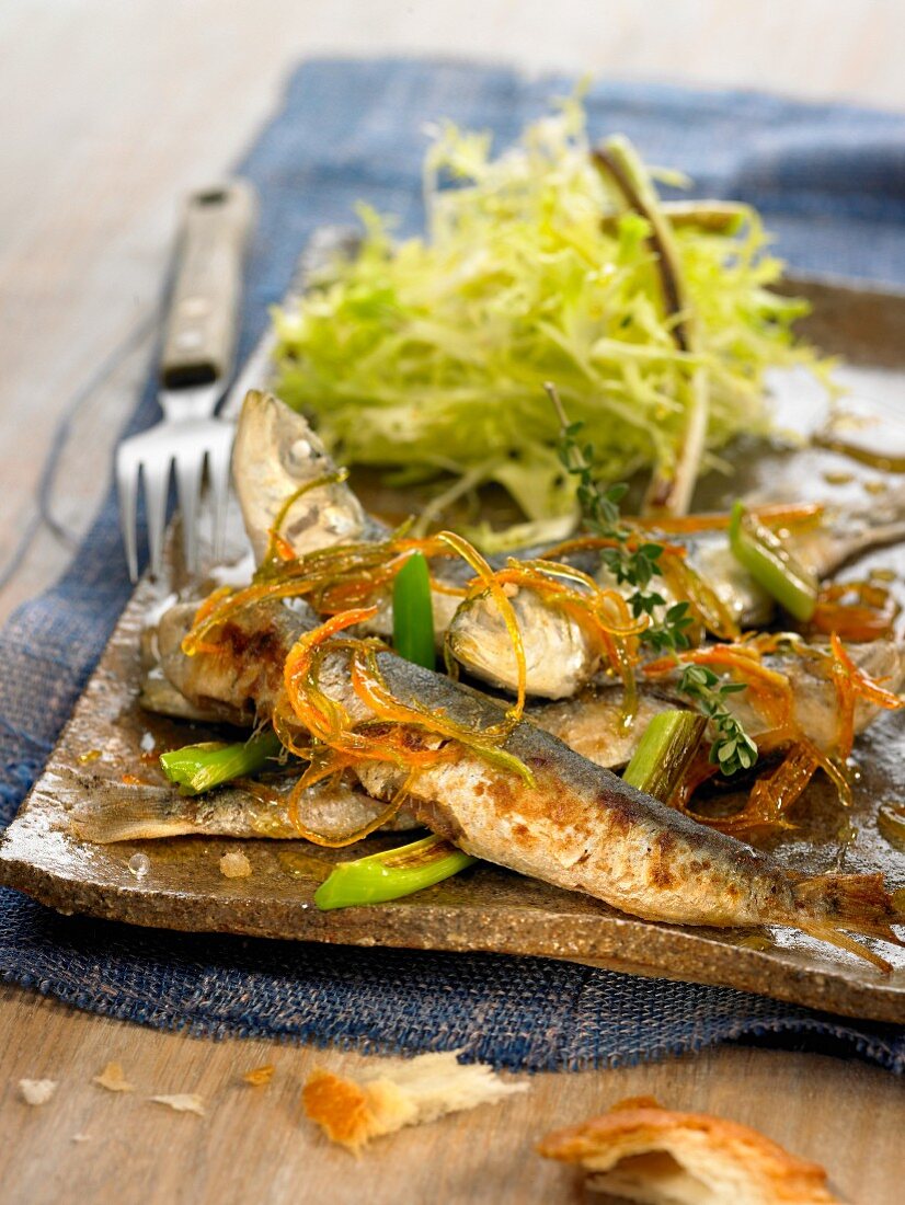 Sardines with citrus fruit zests