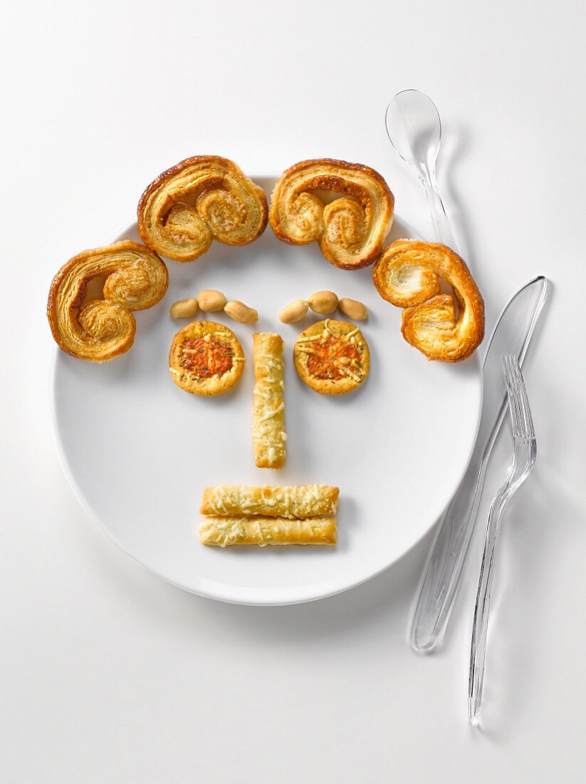 Plate of appetizers in the shape of a face