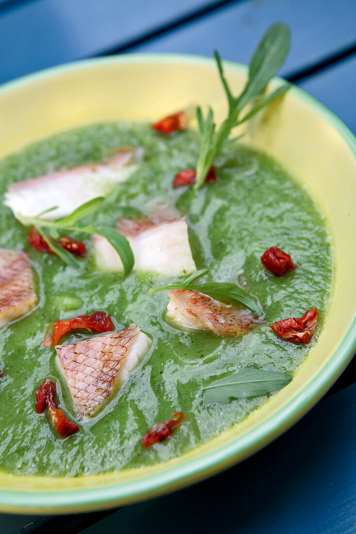 Cream of zucchini soup with scorpion fish