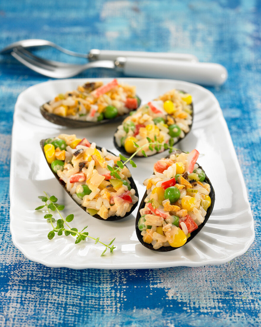 Mussels stuffed with corn and rice