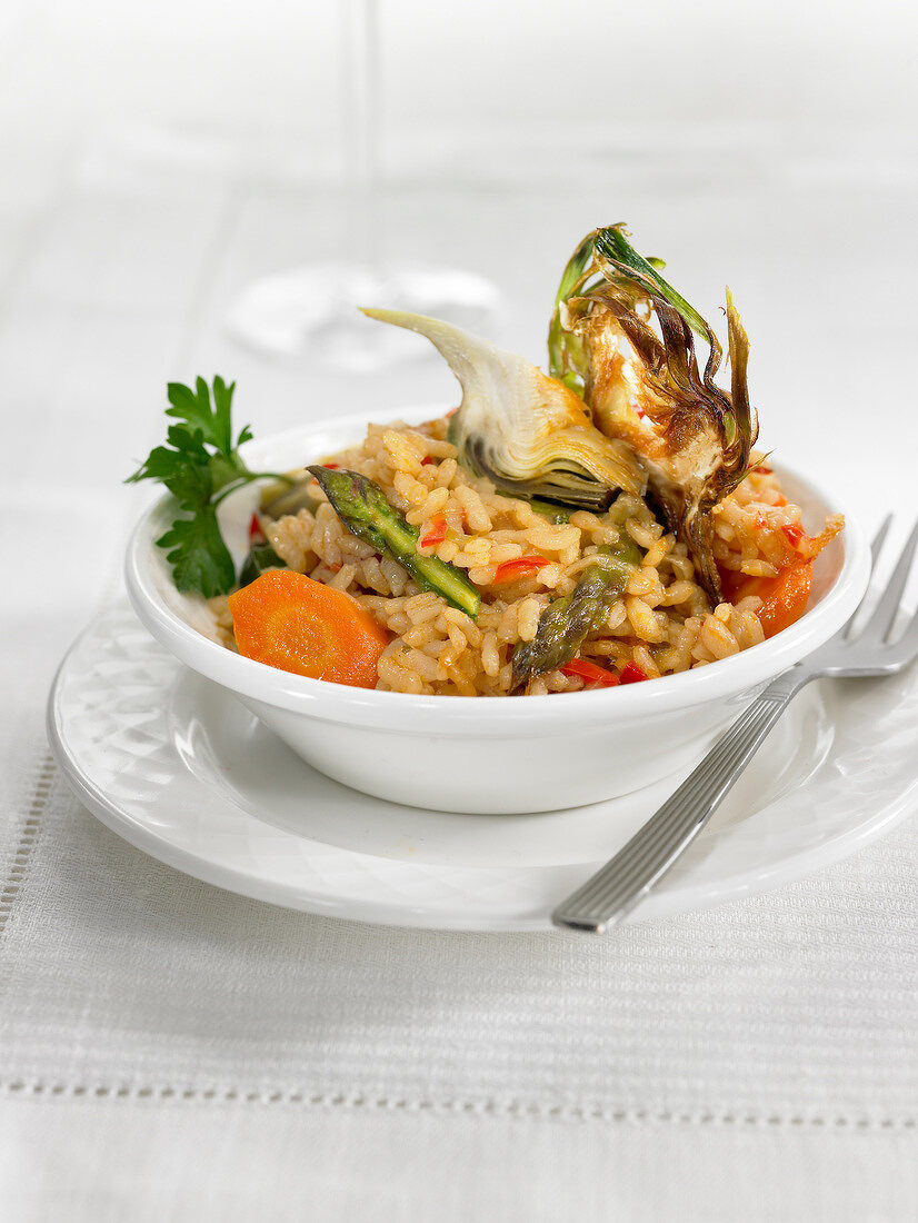 Rice with artichokes, peppers and carrots