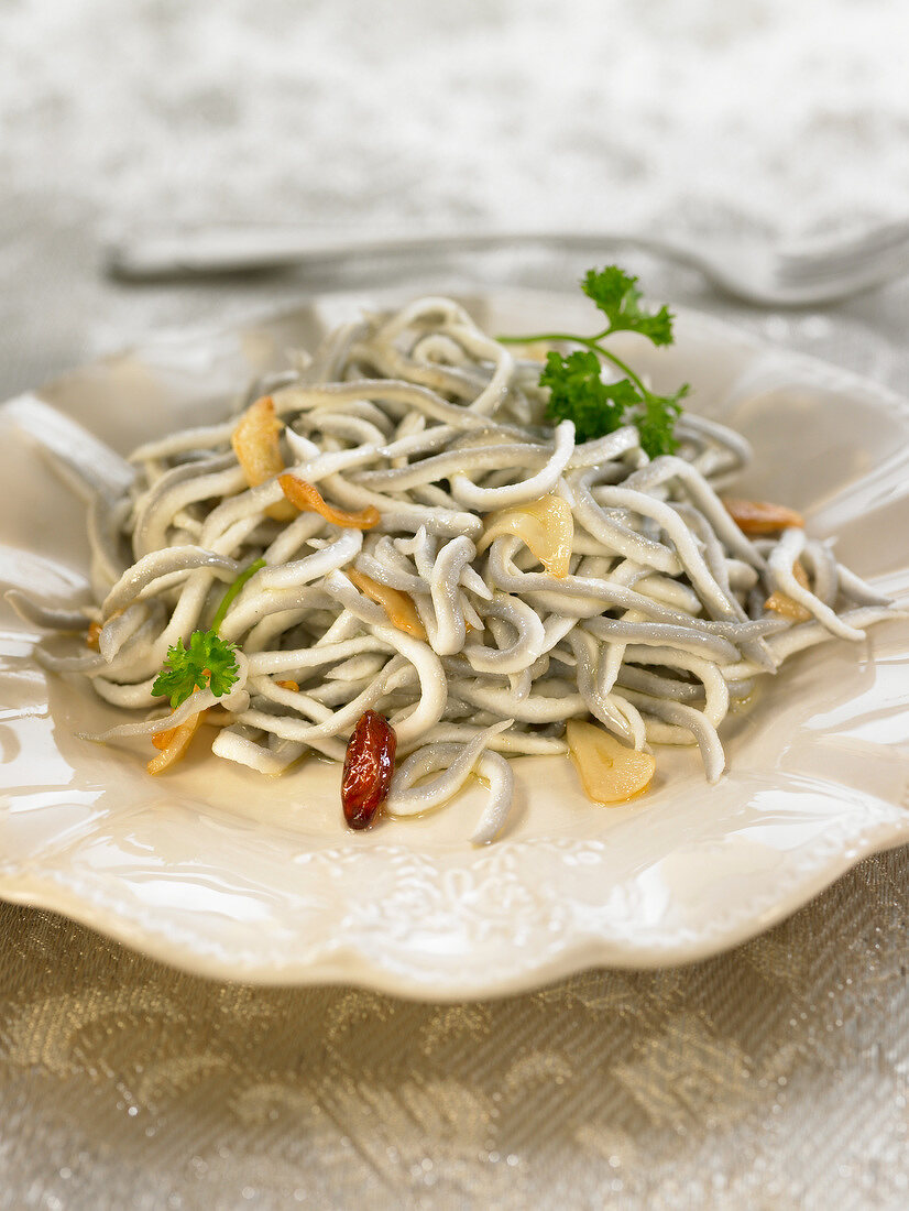 Elvers with parsley and olive oil