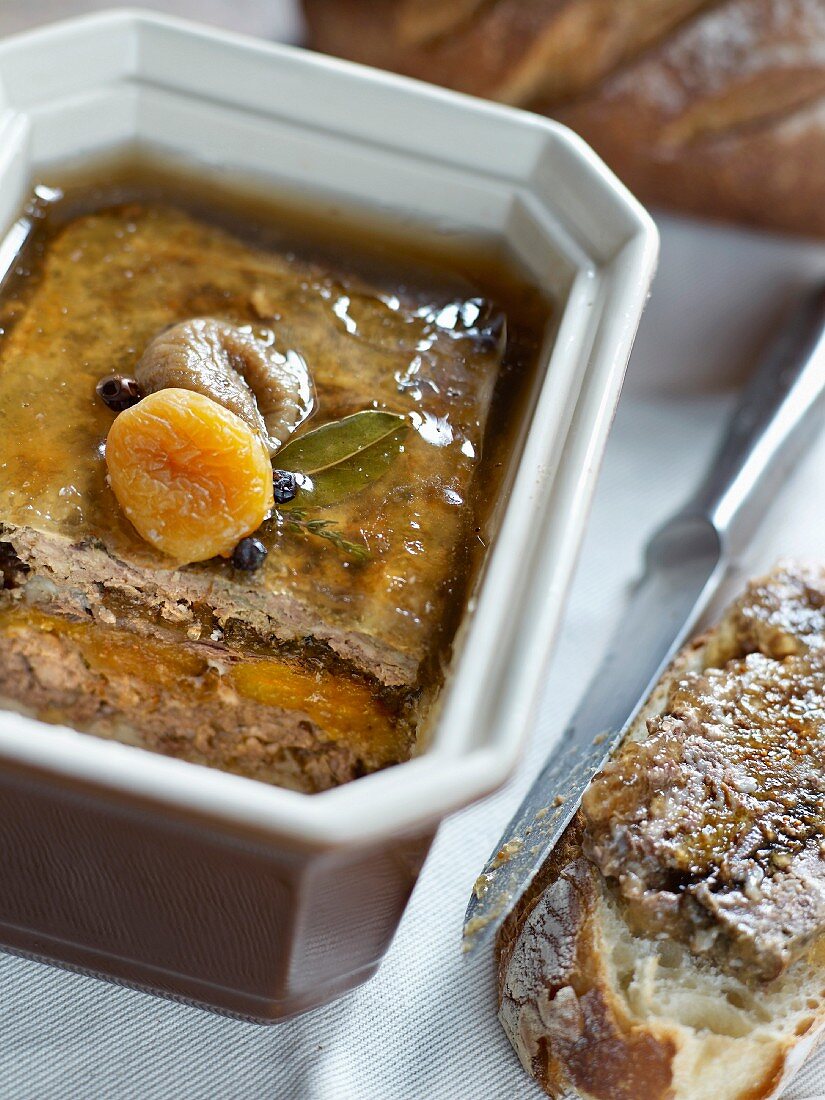 Game poultry terrine with dried apricots and figs