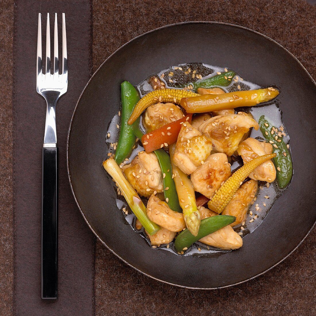 Landes chicken and vegetables cooked in a wok