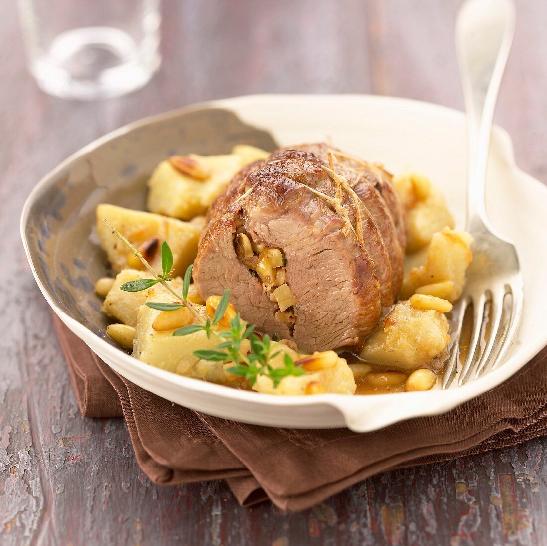 Poitou-Charentes lamb roast with artichoke hearts and pine nuts