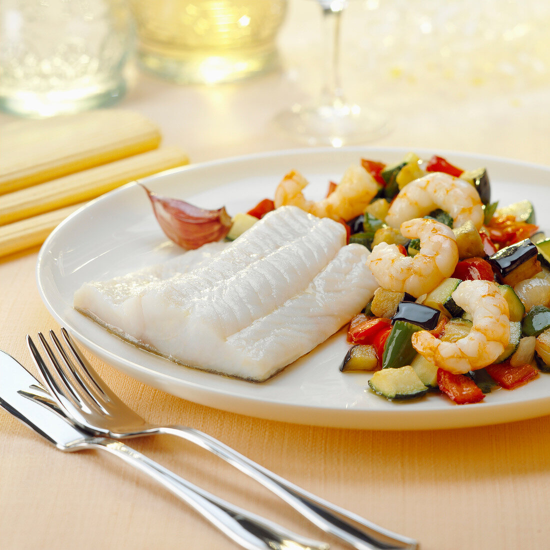 Steam-cooked white fish fillet ,ratatouille with shrimps