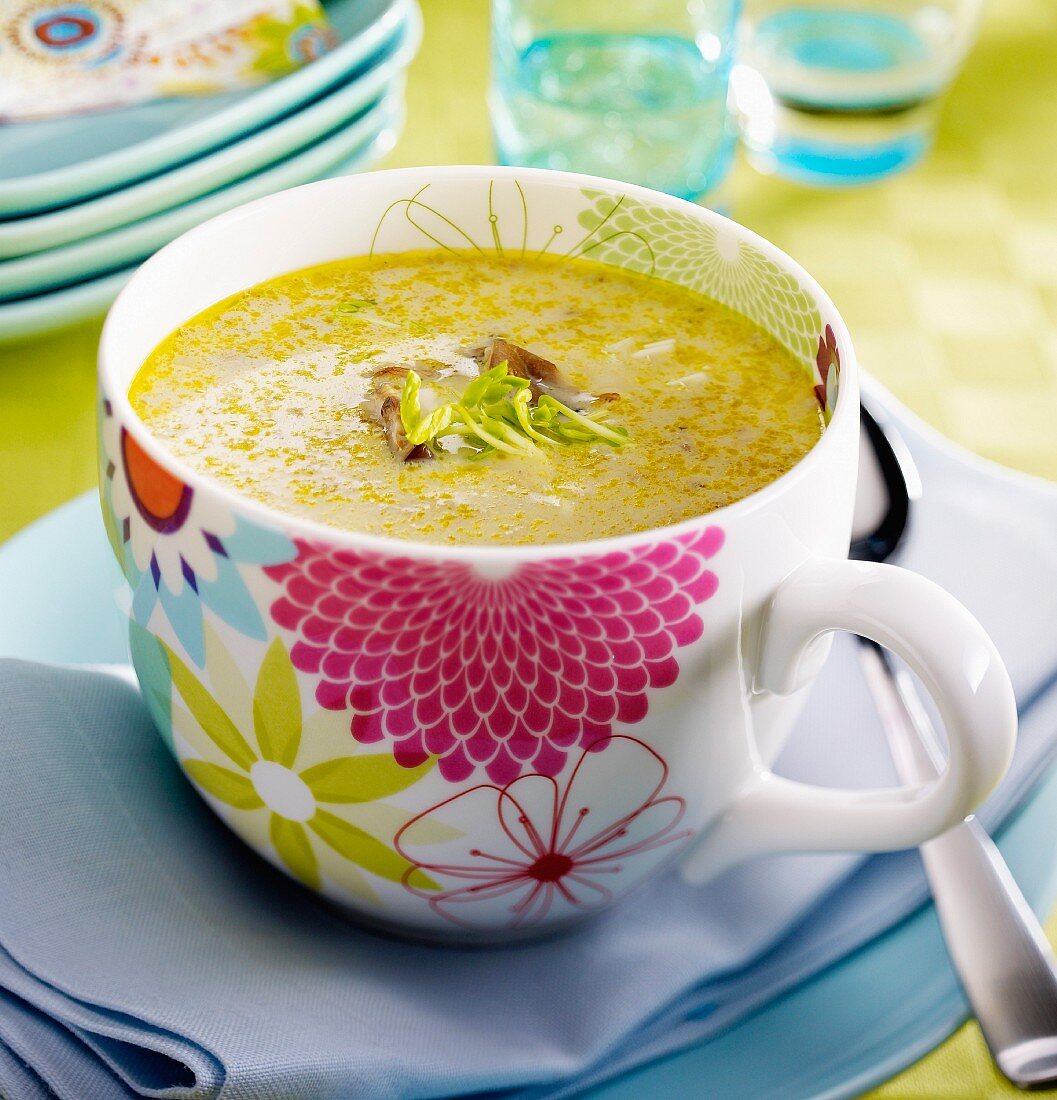 Celery soup with mushrooms and cheese