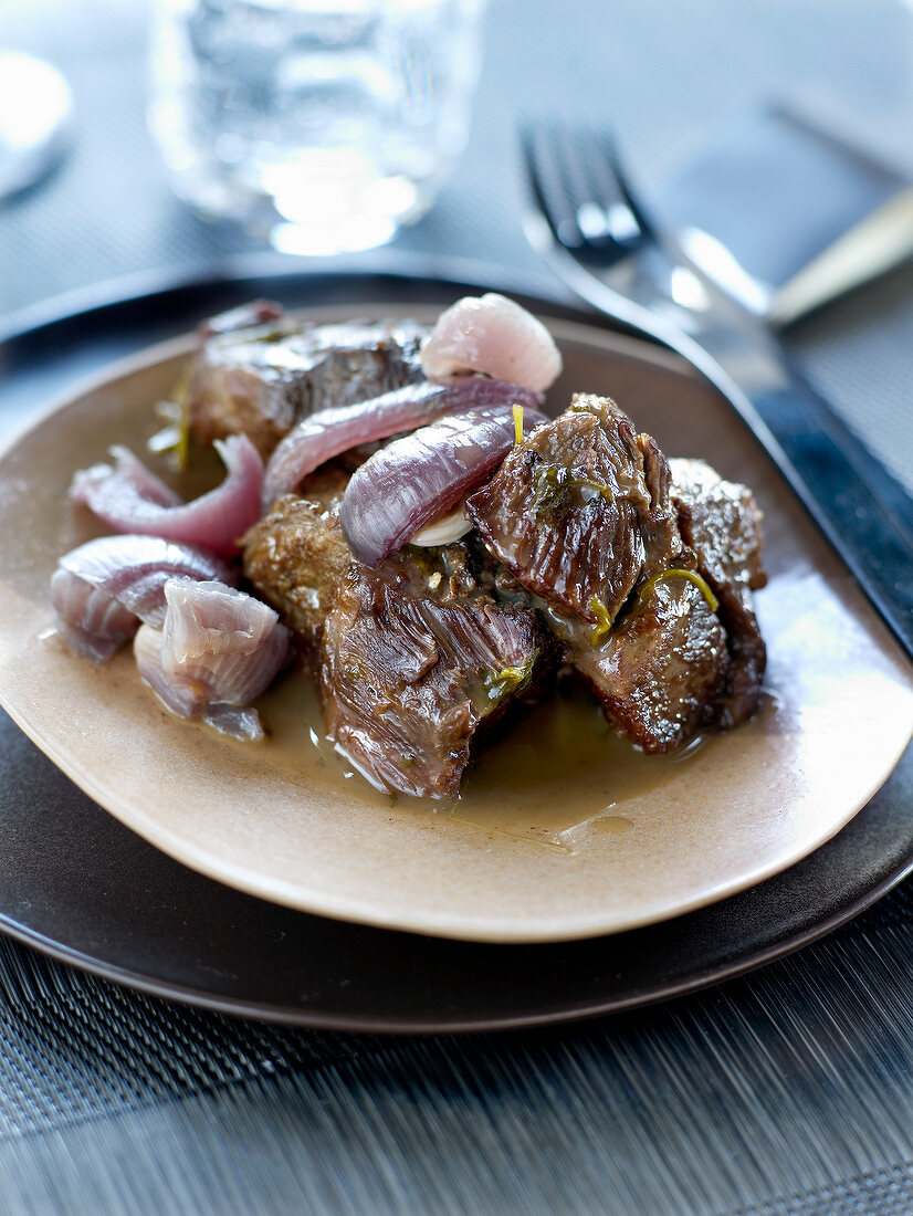 Braised beef with red onions