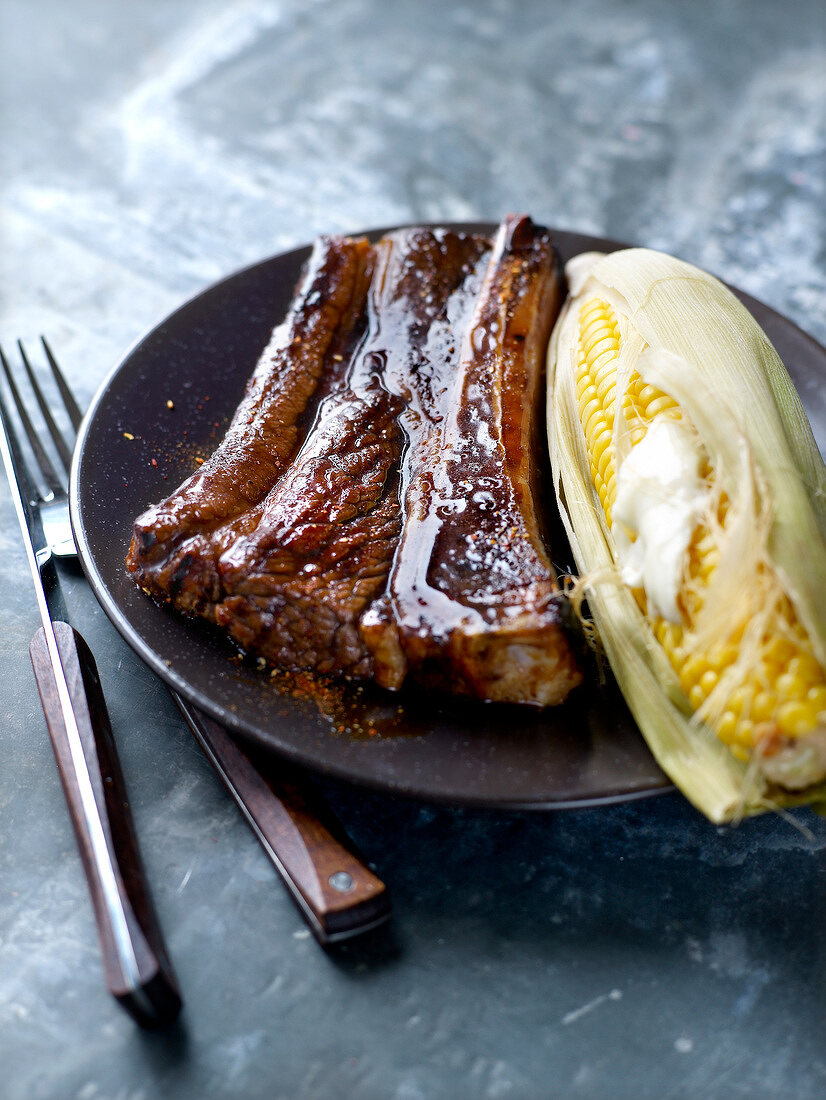 Spicy spare ribs with corn on the cob