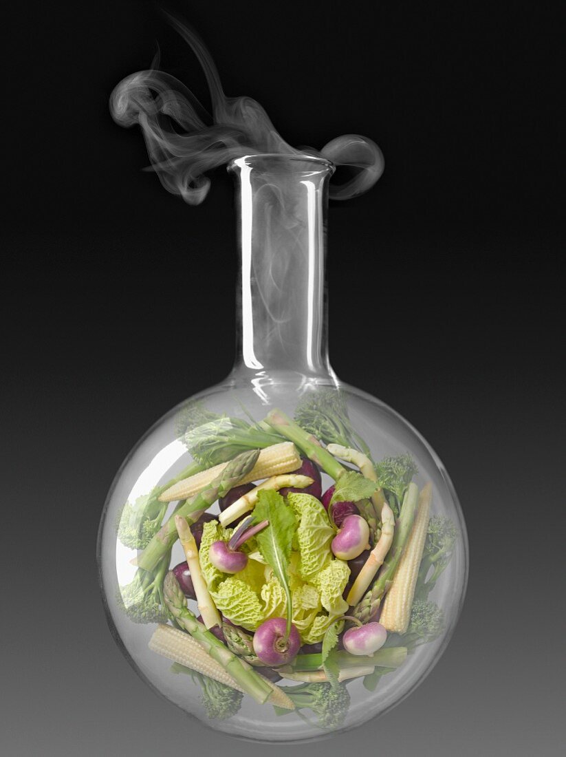 Vegetables in a glass chemical testing bottle
