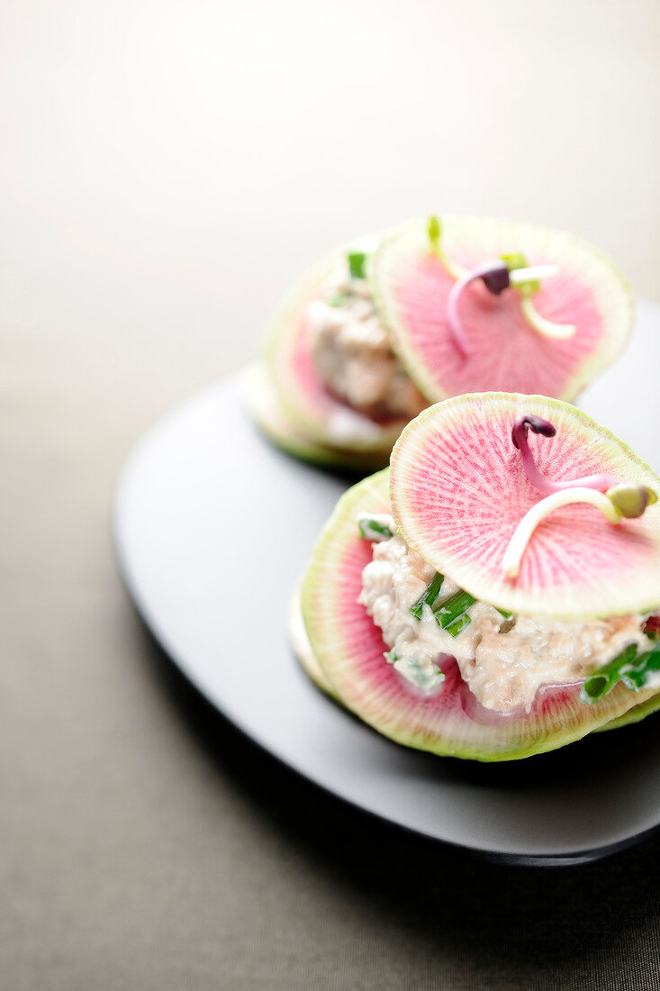 Pink radish and sardine tartare canapés