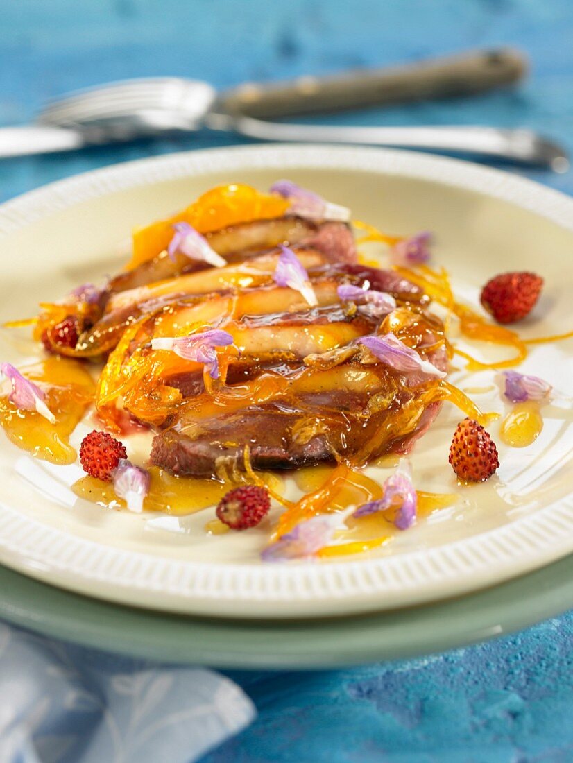 Duck's breast with orange, sage flowers and rosemary