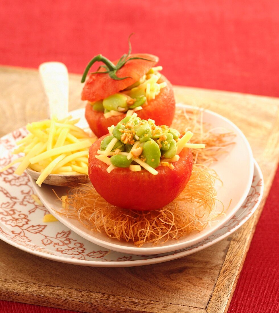 Tomatoes stuffed with broad beans and small sticks of Beaufort