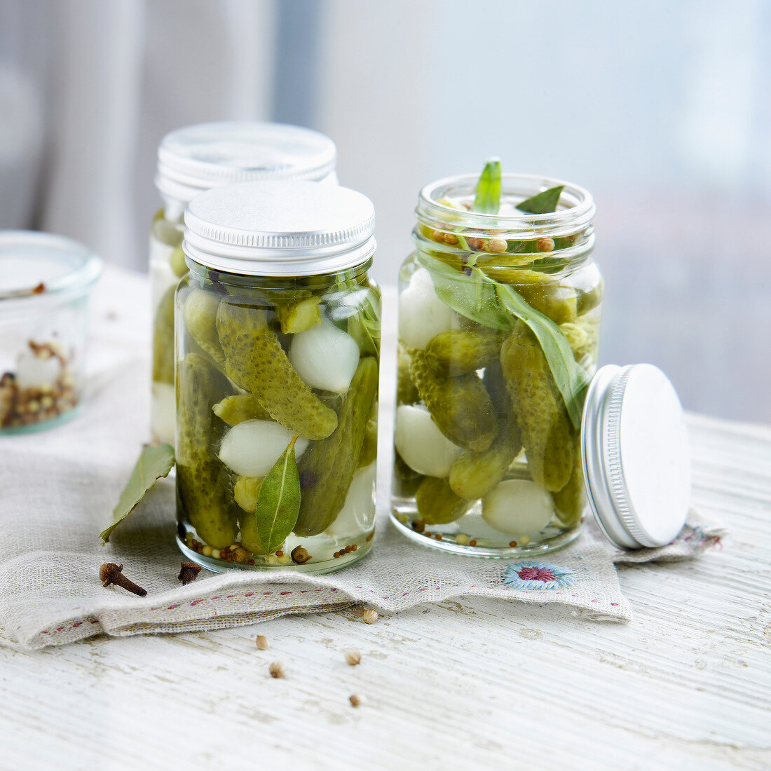 Jars of homemade pickled gherkins