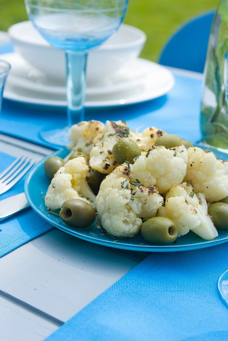 Cauliflower salad with green olives and rosemary