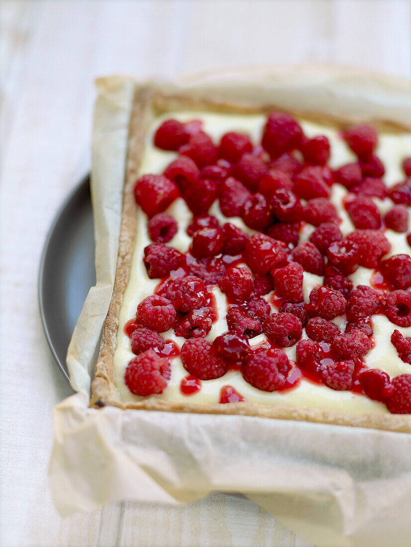 Lemon cream and raspberry tart