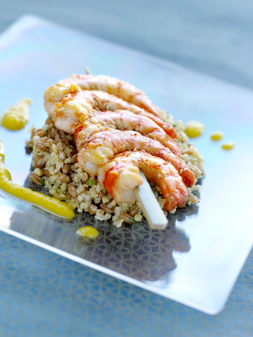 Organic gambas brochette with quinoa