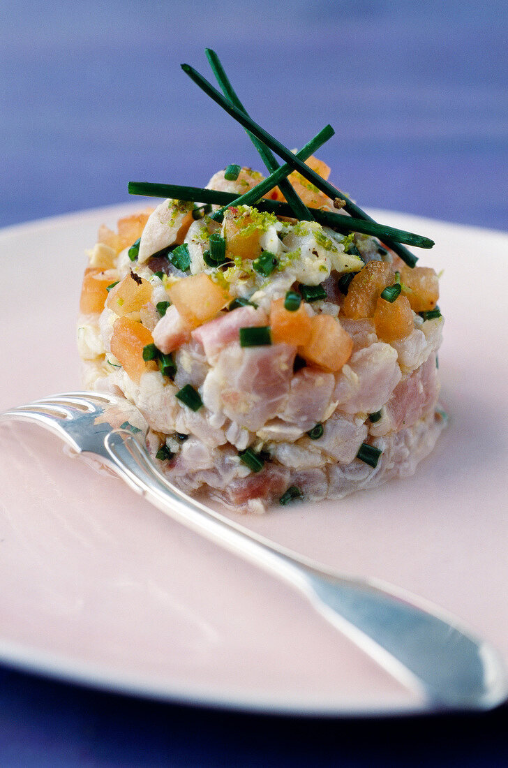 Three fish tartare with chives and ginger