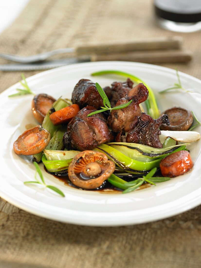 Stag and mushroom stew cooked with red wine and leeks