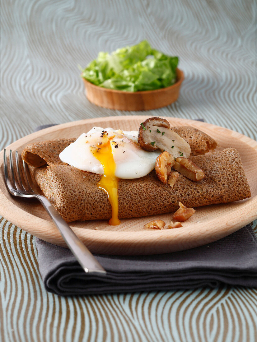 Buckwheat pancake with ceps, chestnuts and soft-boiled egg