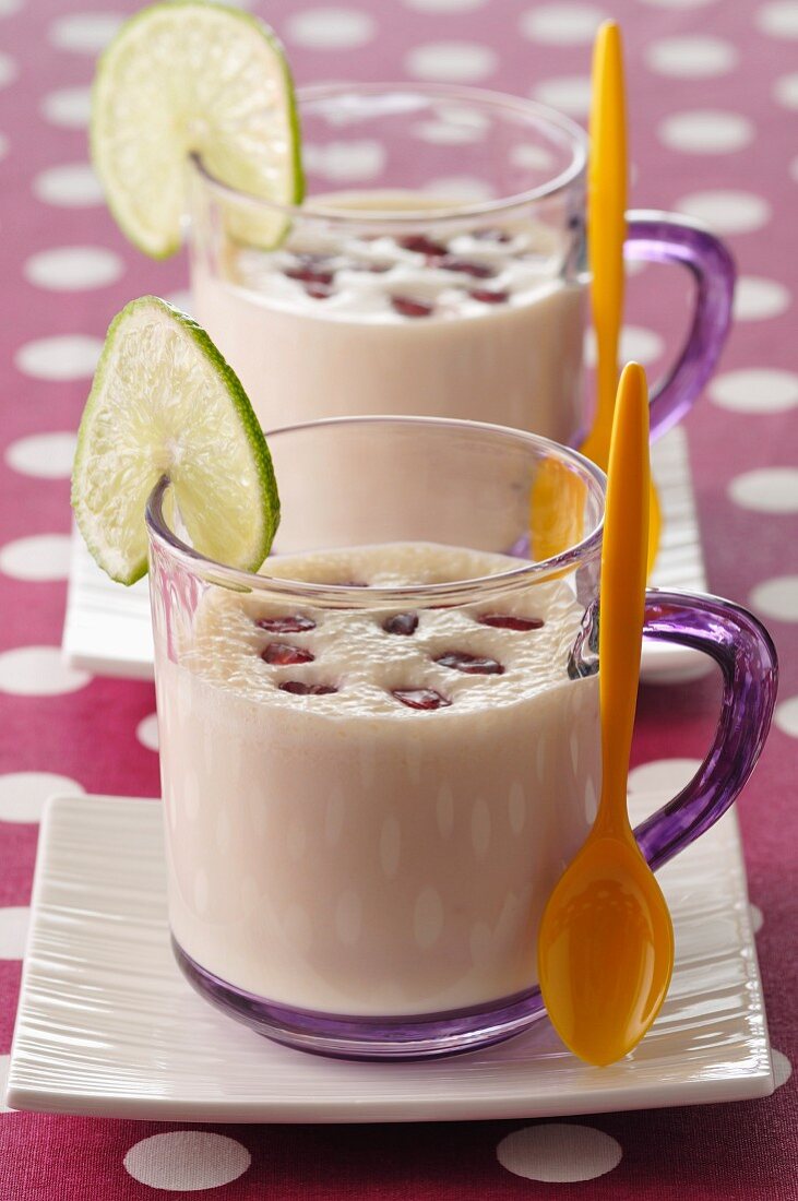 Coconut soup with pomegranate seeds