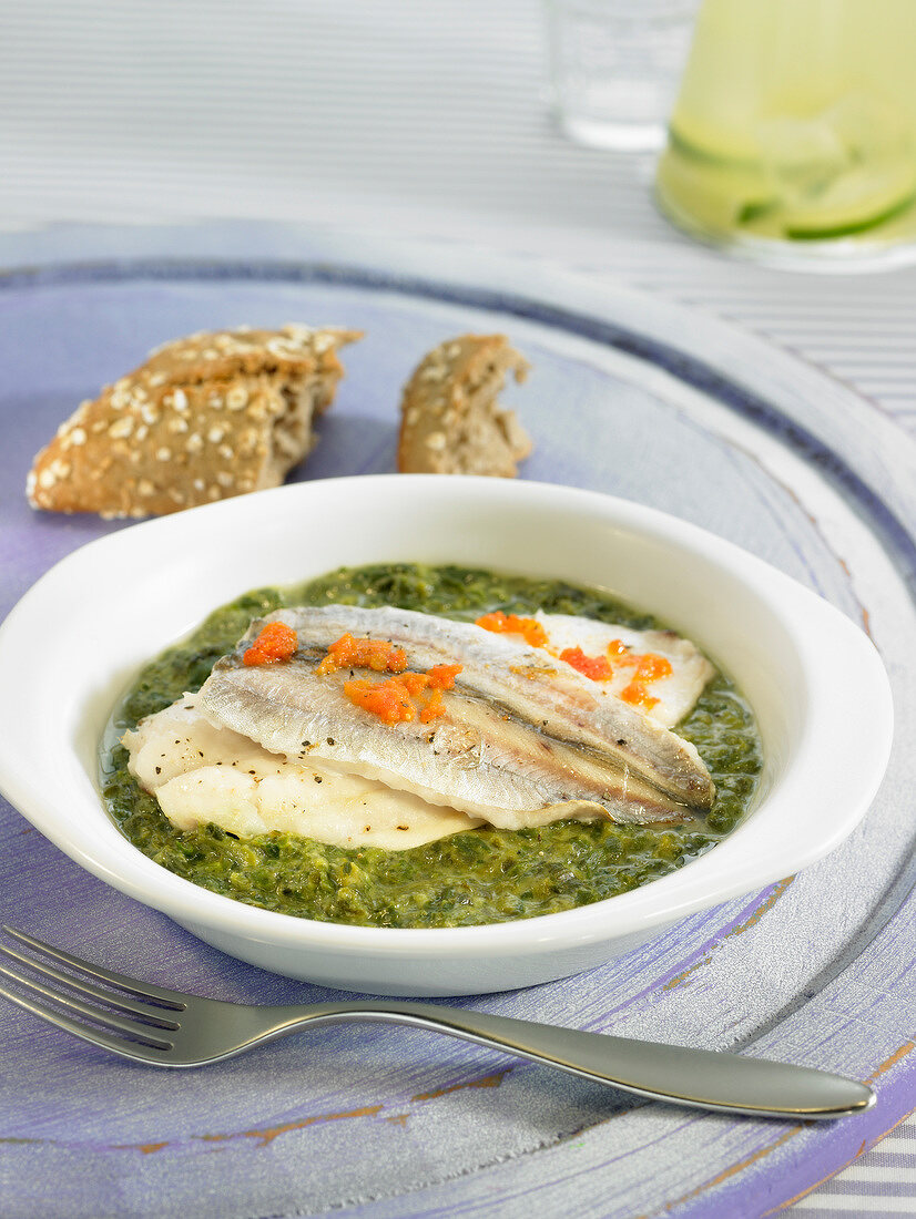 Blue whiting with creamy spinach and trout roe