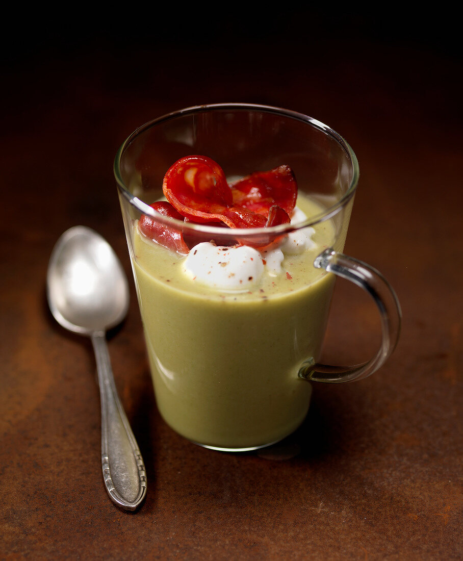 Cream of lettuce soup with goat's cheese and bacon
