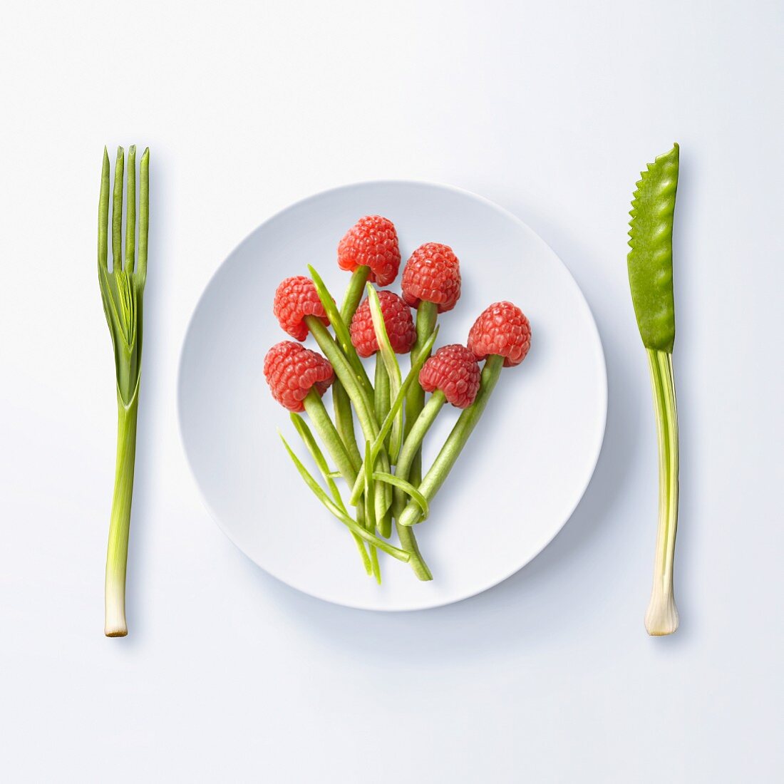 Bunch of flowers made with green beans and raspberries