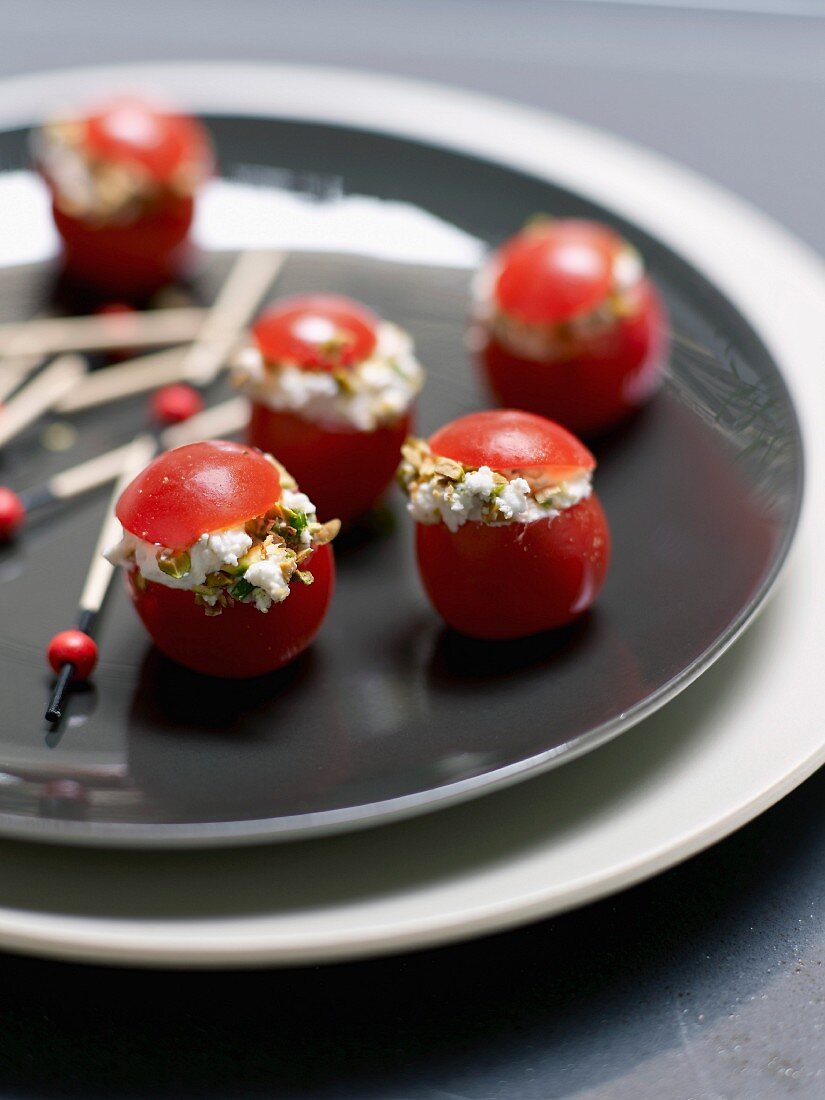 Cherry tomatoes stuffed with goat's cheese