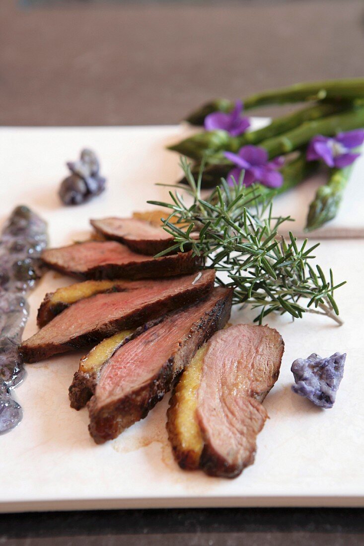 Grilled duck breast with rosemary