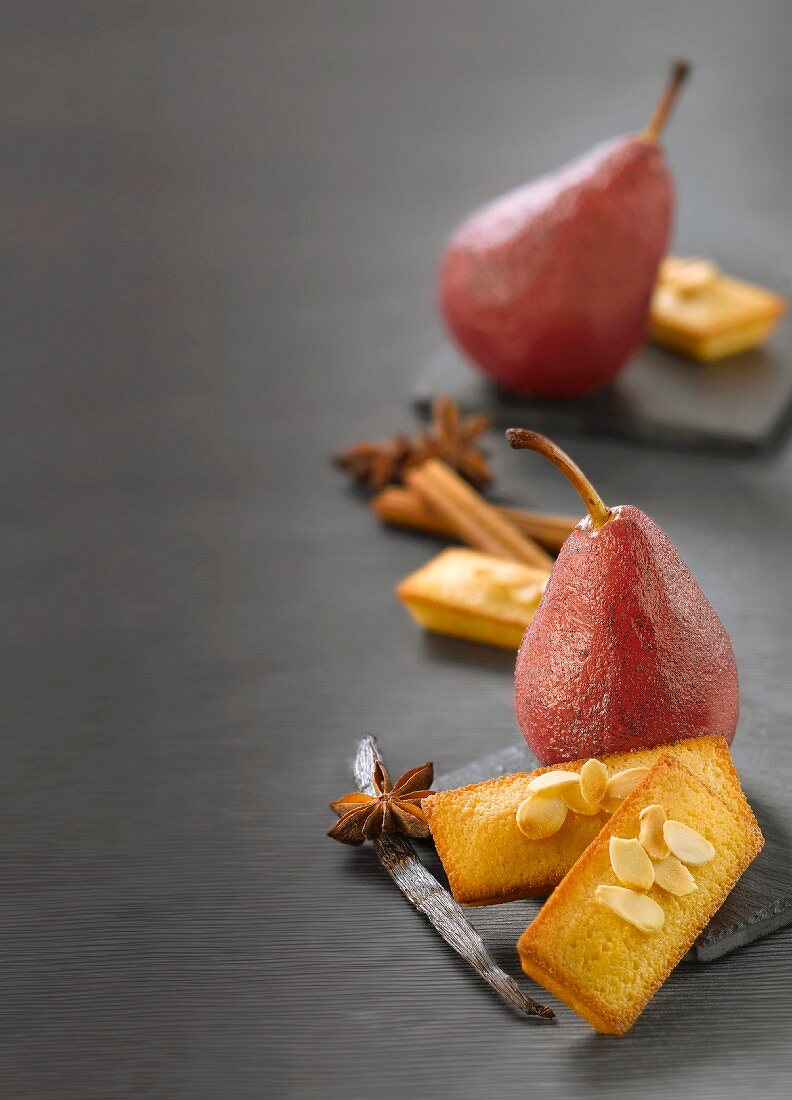 Pears poached in spicy wine, almond Financiers