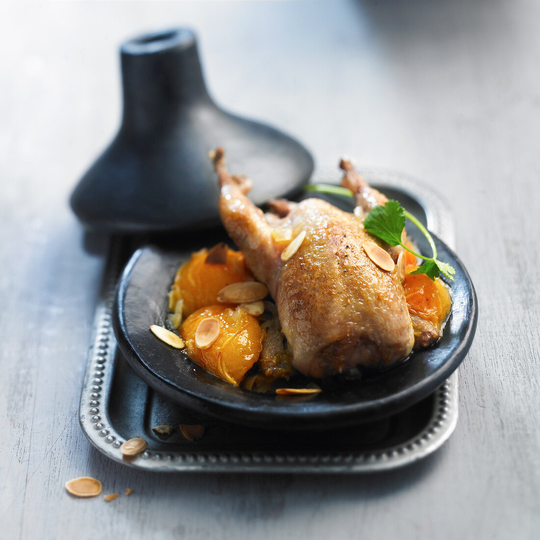 Quail and apricot Tajine