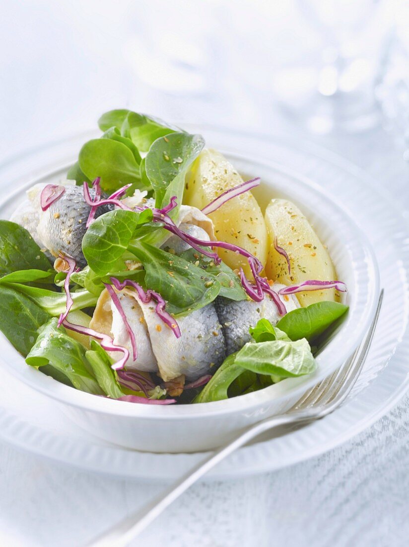 Corn salad,rollmops and steamed potato salad