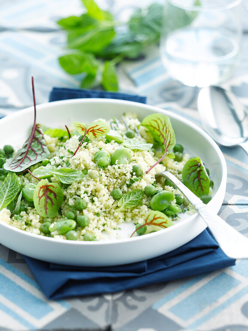 Summer Couscous with fava beans,baby beetroot leaves and fresh mint