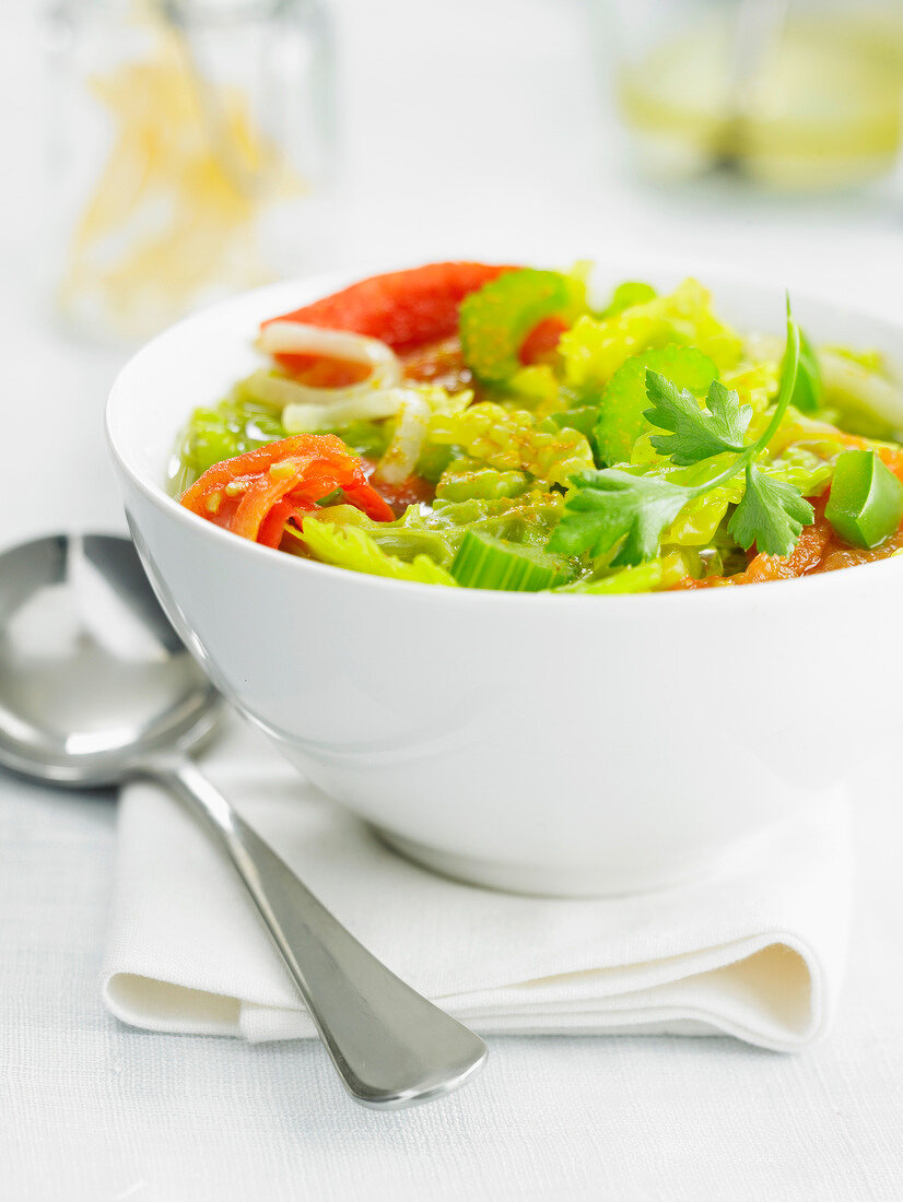 Curly cabbage, celery and tomato soup