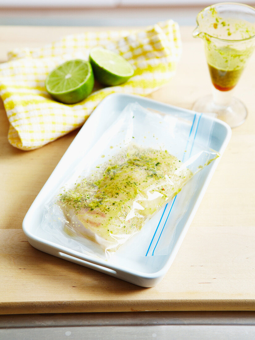 Poached cod with lime and herb sauce