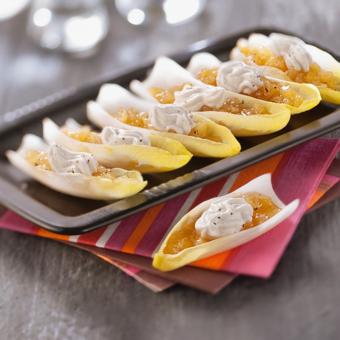 Chicory leaves filled with caramelized pears and roquefort whipped cream